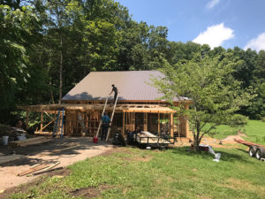 Woodard Whitetails of Kentucky - lodging being built - metal roofing added